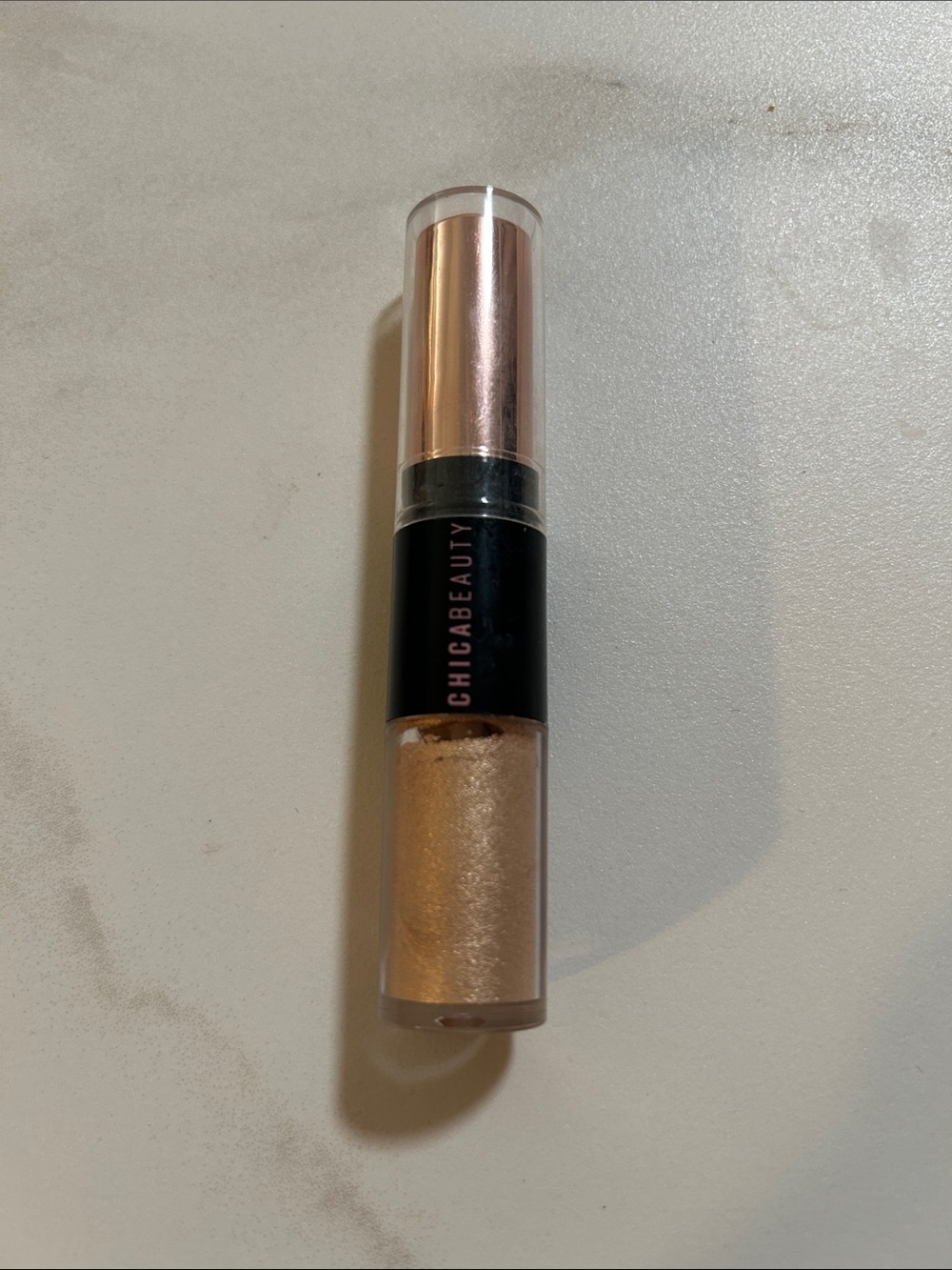 Gold Liquid Highlighter Stick - Champagne Glow Duel Ended
